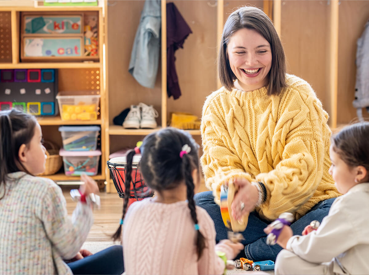 An early childhood educator teaching her class.