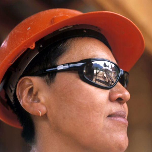 worker wearing hard hat and protection googles