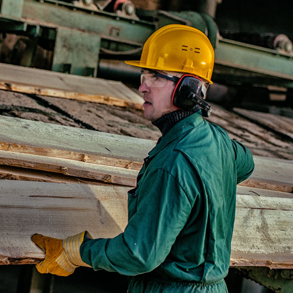 Man working in a lumber mill